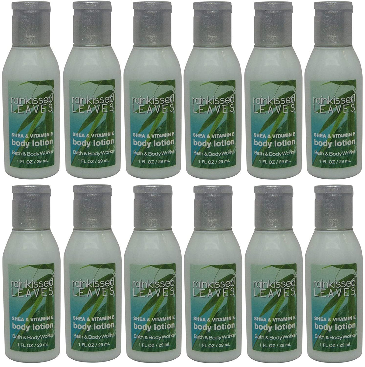 LOT: 12 Bath and Body Works Travel Size Body Lotion - Rainkissed Leaves - Shea and Vitamin E - 1 Ounce Bottles - Brought to you by Luxe & Lark